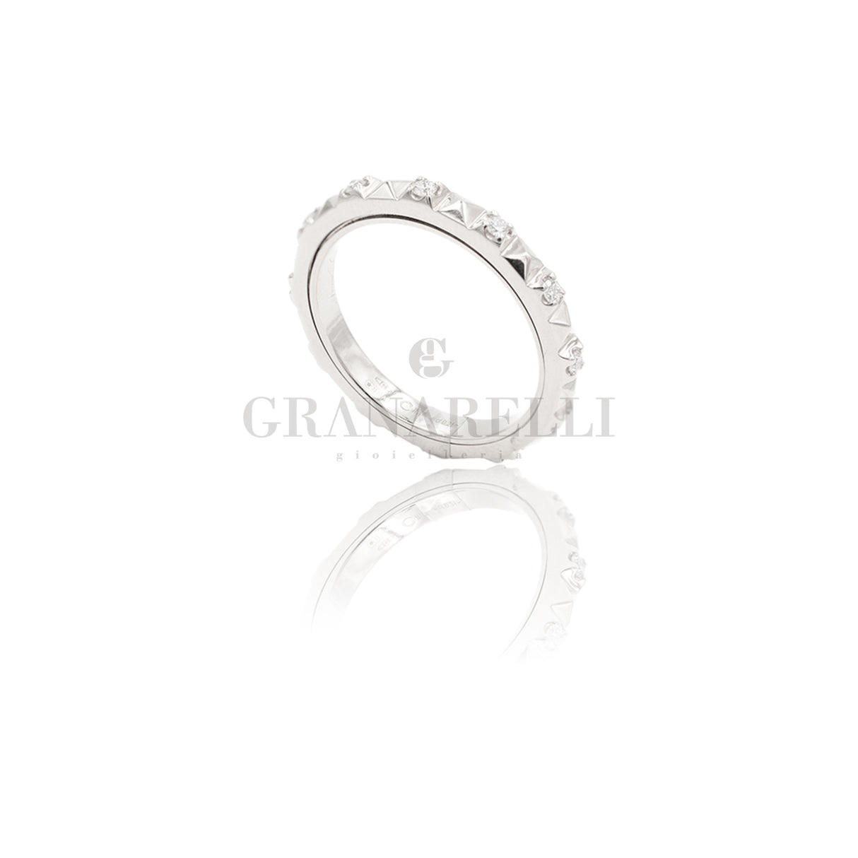 White gold studs and diamonds ring