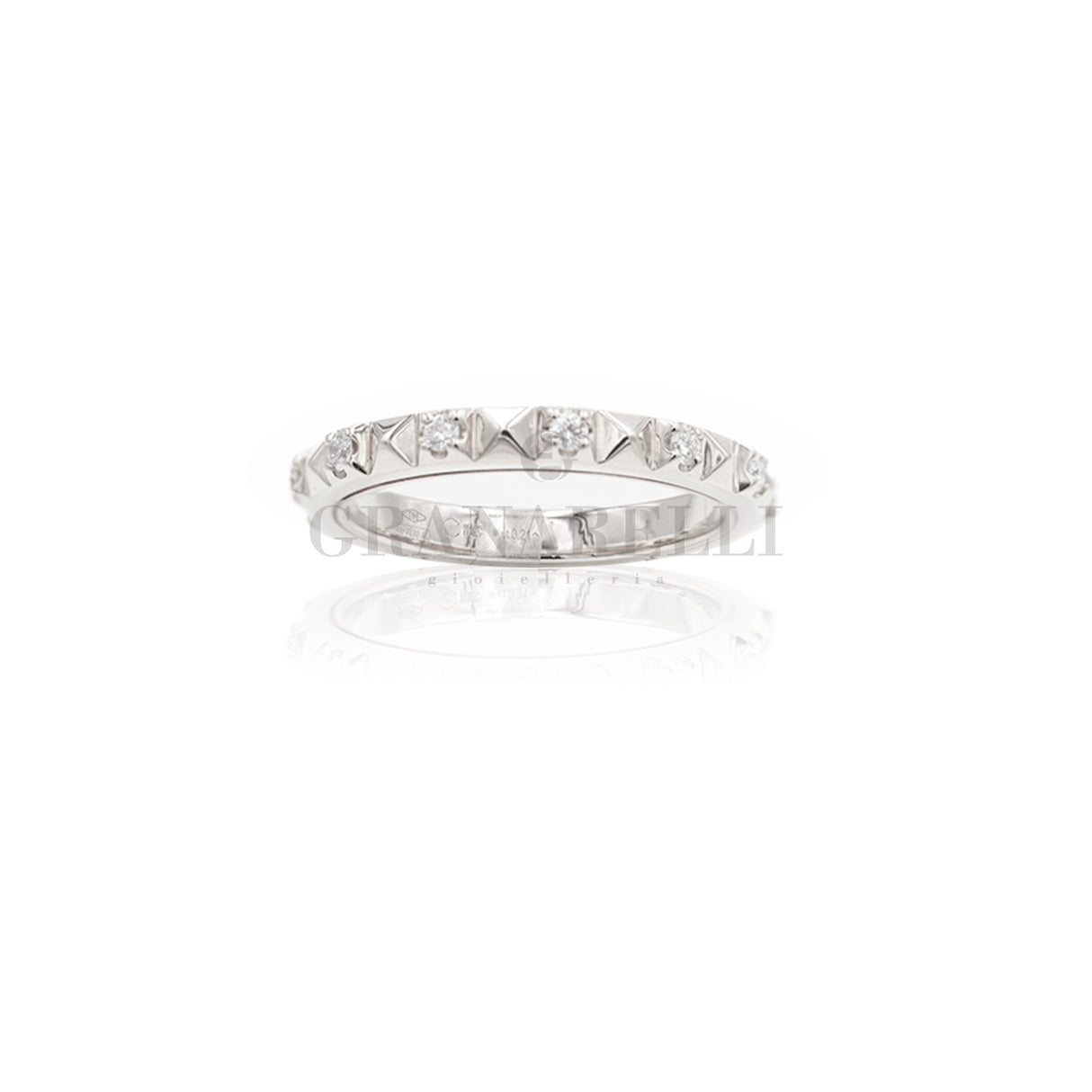 White gold studs and diamonds ring