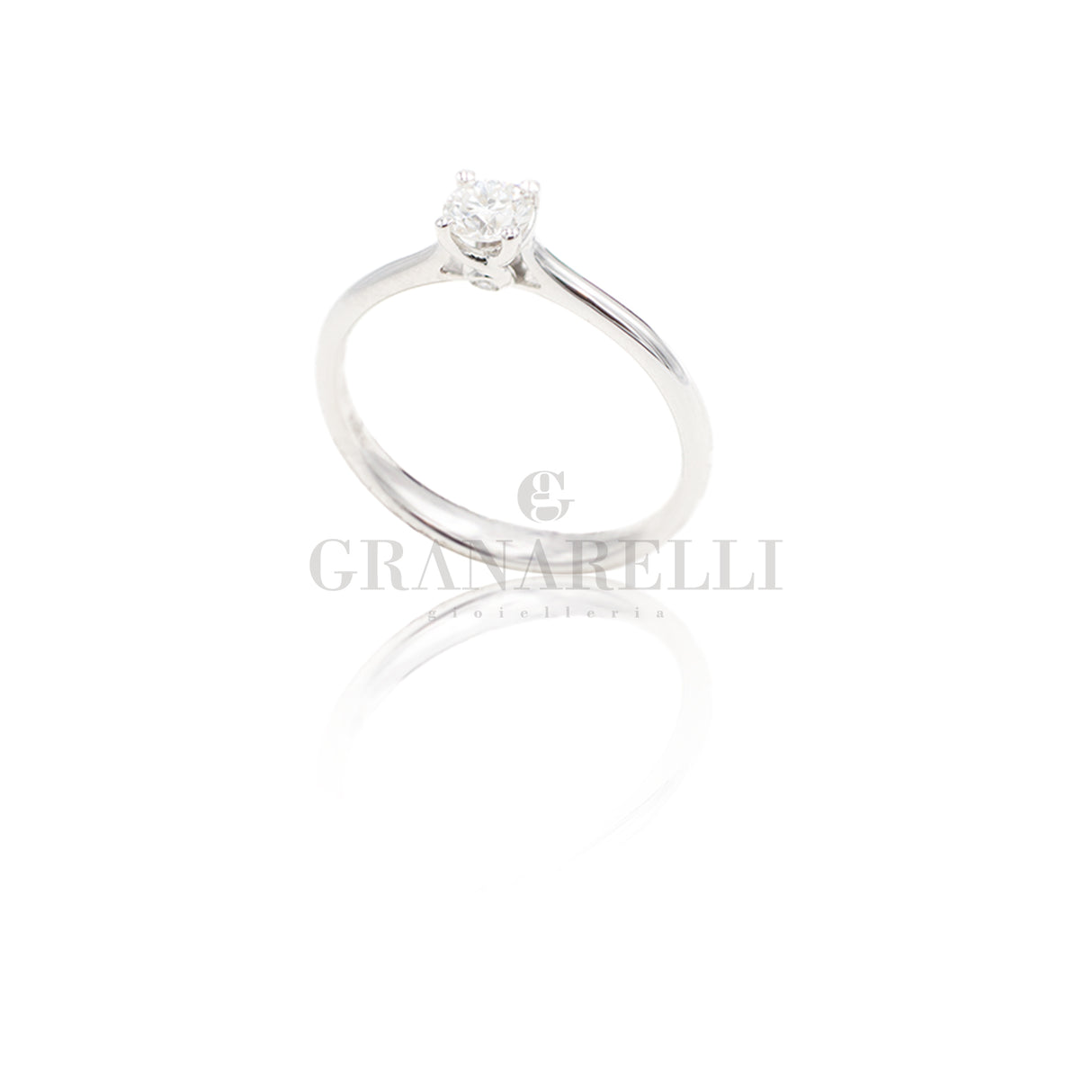 Anello Solitario 0.30 con Brillante laterale Oro Bianco