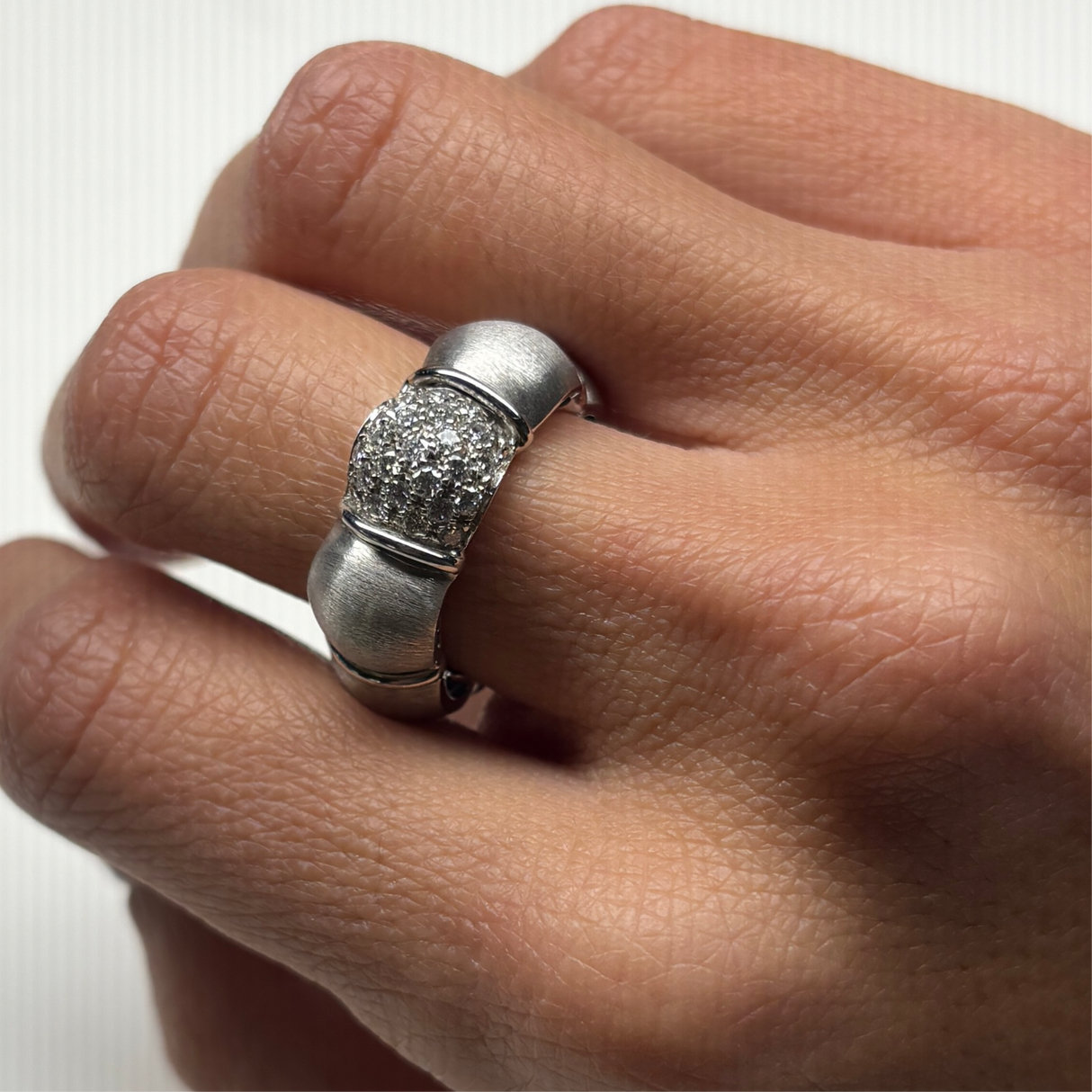 White diamond diamonds ring in sandblasted white gold