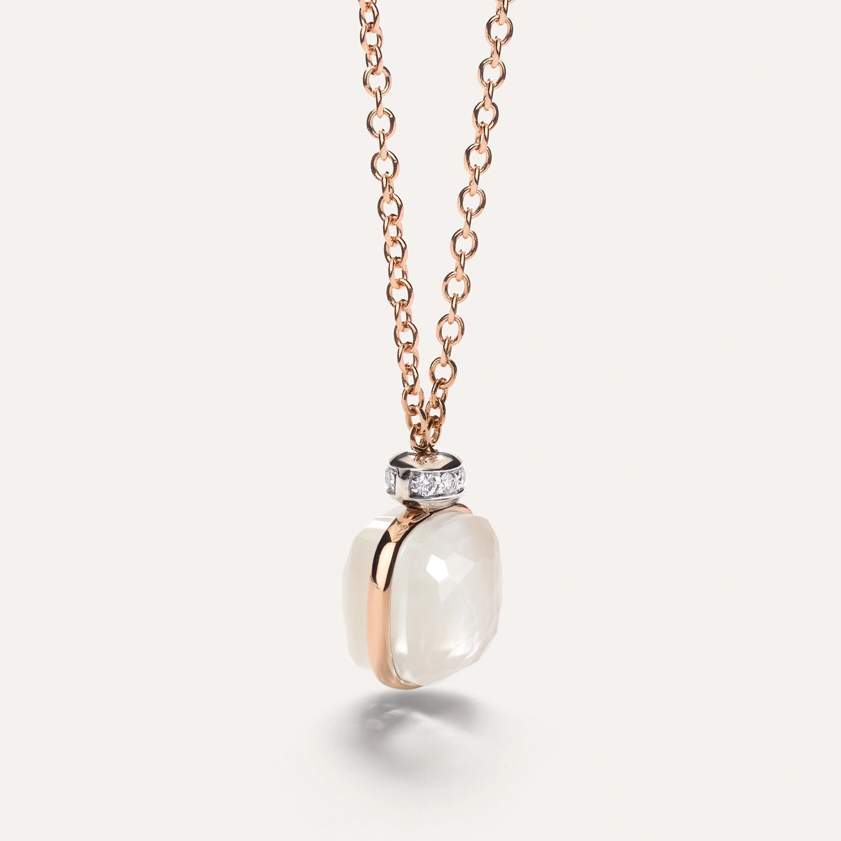 Collana Pendente Nudo in Oro Rosa, Topazio Bianco, Madreperla e Diamanti-Girocolli-POMELLATO-Gioielleria Granarelli