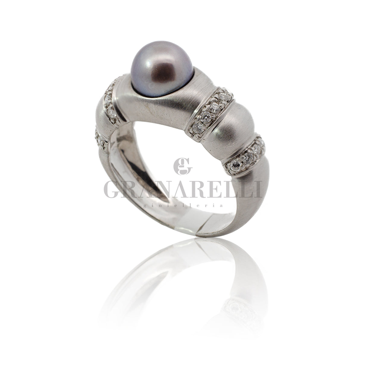 Anillo de corazón de zafiro y diamante