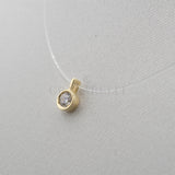 Collana invisibile con diamante 0.11kt in oro giallo