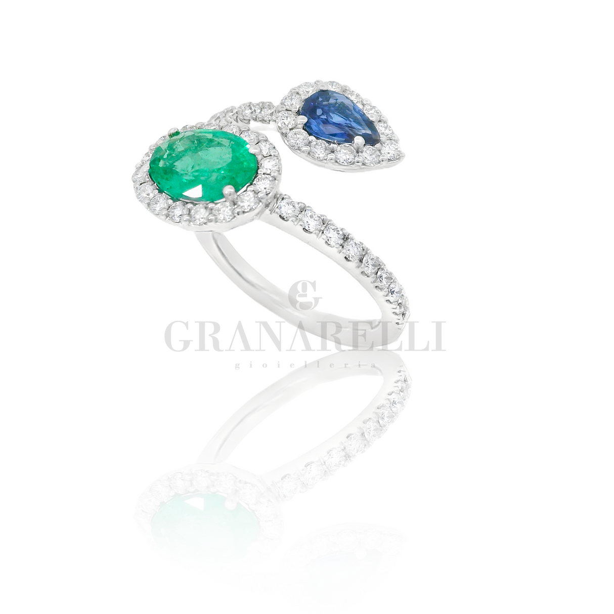 Anello doppio in Oro Bianco con Smeraldo 1.00kt e Zaffiro 0.38kt con Diamanti