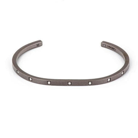 Bracciale Linear rigido in Titanio, Oro 18kt e 9 diamanti bianchi-Bracciali-MANO- [SKU] -Gioielleria Granarelli