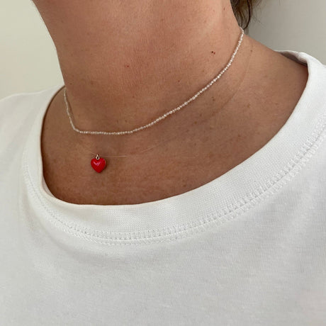 Collana invisibile con cuore rosso-Collane-GioGio- [SKU] -Gioielleria Granarelli