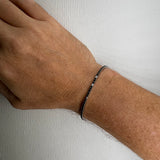 Bracelet de tennis en diamant noir Spot 5 Diamants