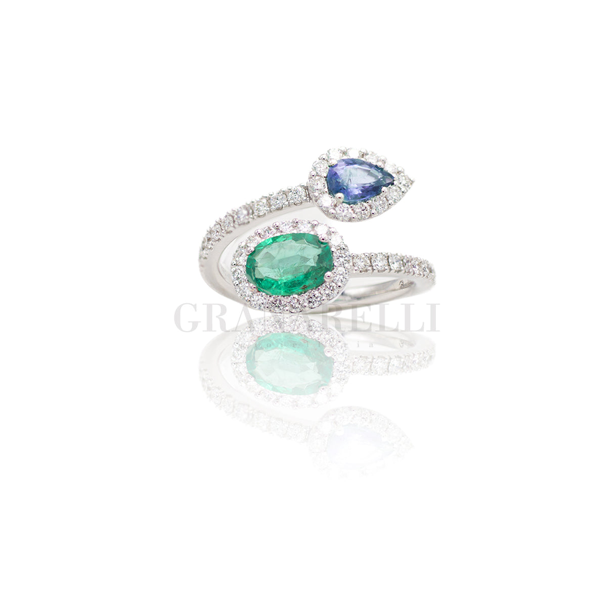 Anello doppio in Oro Bianco con Smeraldo 1.00kt e Zaffiro 0.38kt con Diamanti