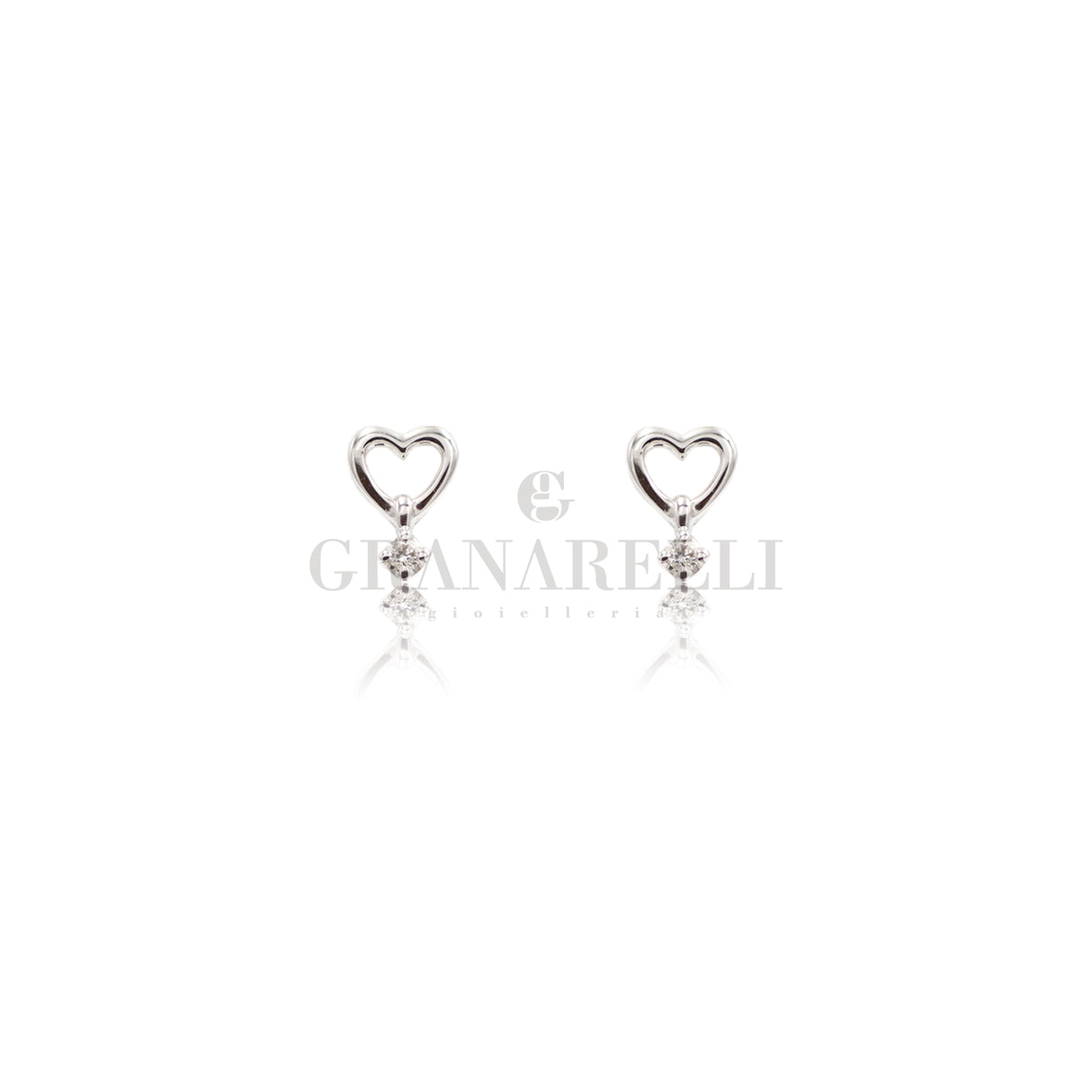 White gold heart and diamond earrings